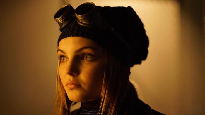 Selina Kyle wearing goggles and beanie