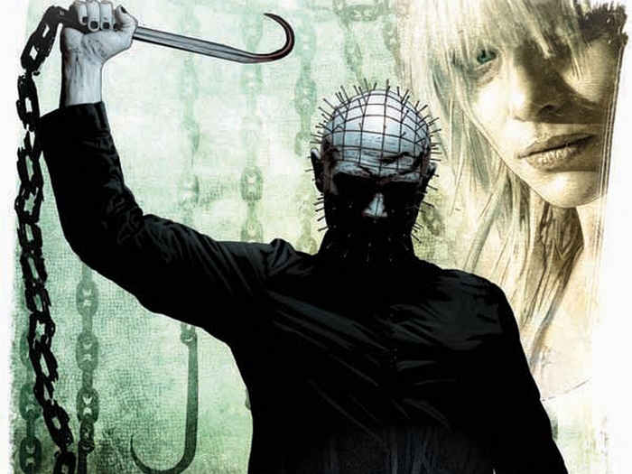 Pinhead from Hellraiser holding a chain and hook