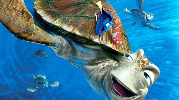 Dory and Nemo from Finding Nemo riding on a sea turtle