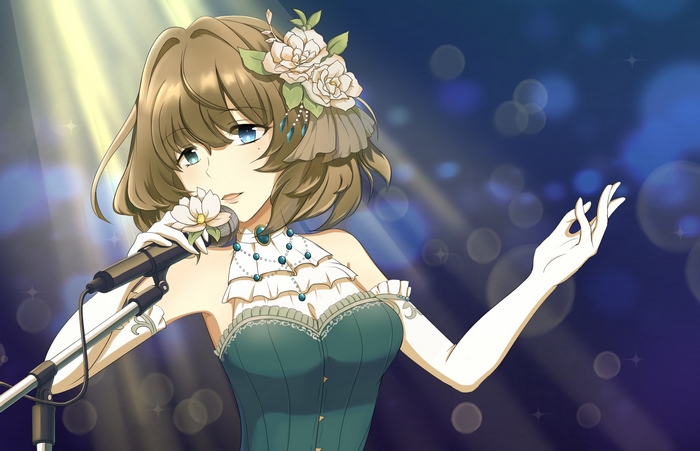 Kaede Takagaki singing into a microphone