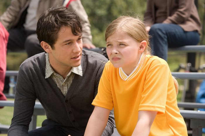 Tom Hansen and girl on bleachers