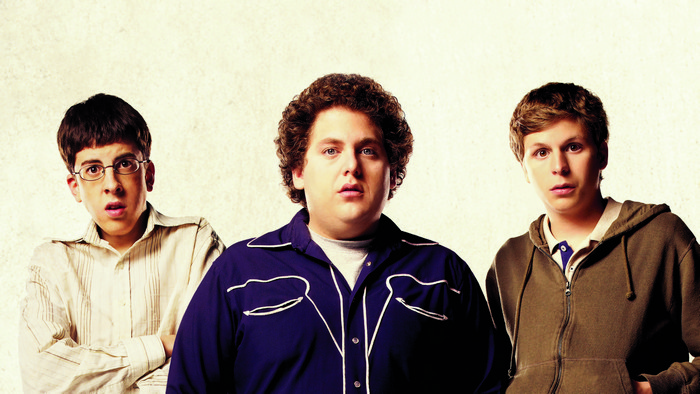 Three young men posing for a photo