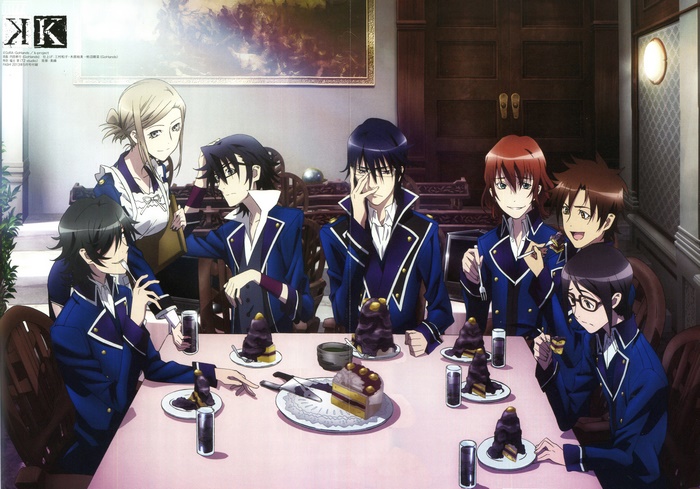 K Characters at a Table with Cake