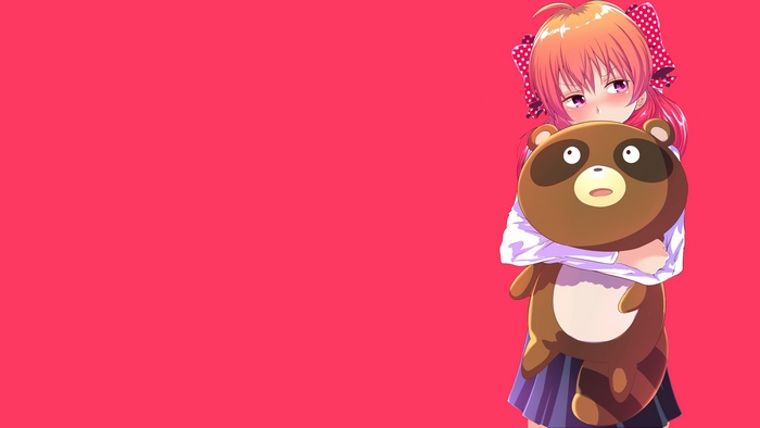 Chiyo Sakura holding a tanuki plush
