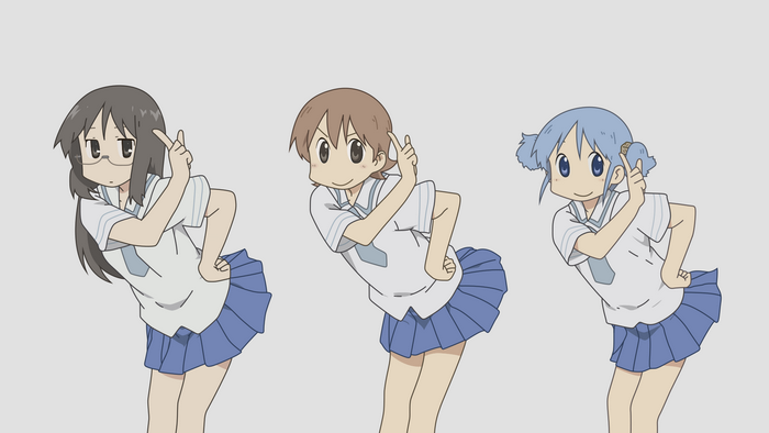 Three girls in school uniforms posing