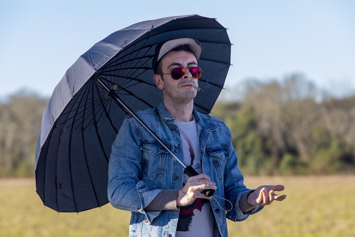 Cassidy with Umbrella and Cigarette
