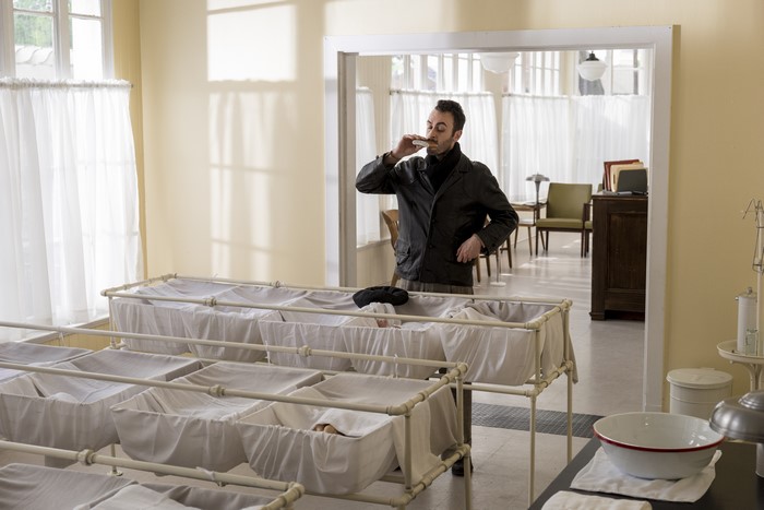 Cassidy from Preacher in a nursery