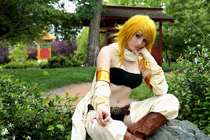 Leone from Akame Ga Kill! cosplay in a garden