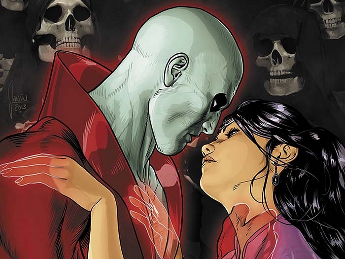 Deadman and a woman with skulls in the background