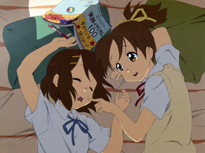 Ui Hirasawa and Yui Hirasawa lying down