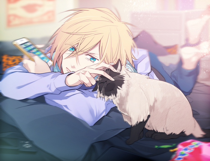 Blonde-haired man with blue eyes petting a Siamese cat