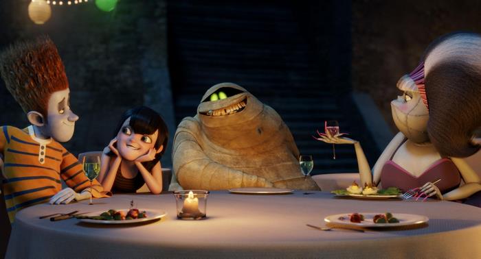 Mavis and friends at a dinner table