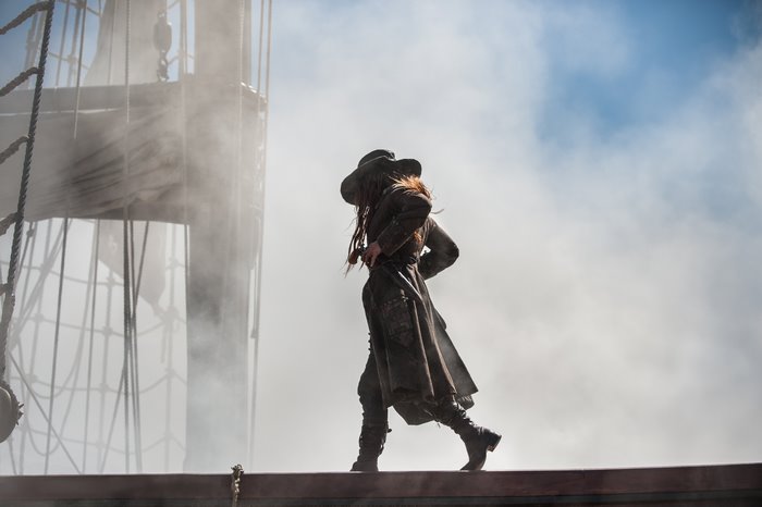 Anne Bonny from Black Sails on a ship