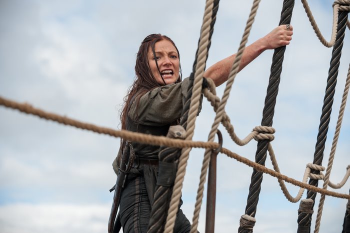 Anne Bonny from Black Sails climbing rigging