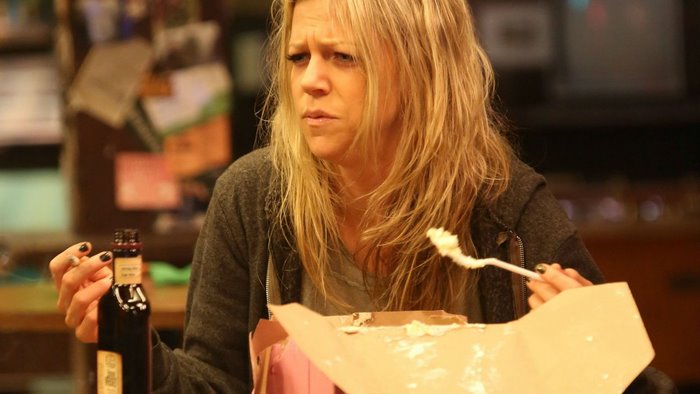Deandra Reynolds eating cake and smoking