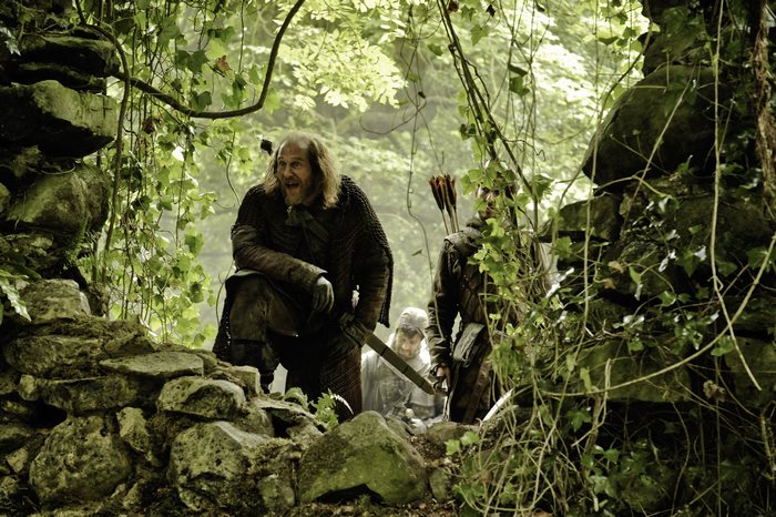 Thoros of Myr and companions in a forest