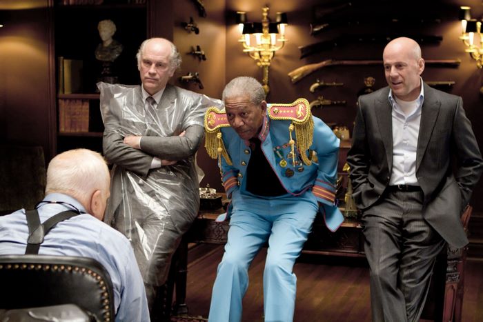 Frank Moses and companions in a room