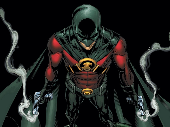 Red Robin holding two smoking guns
