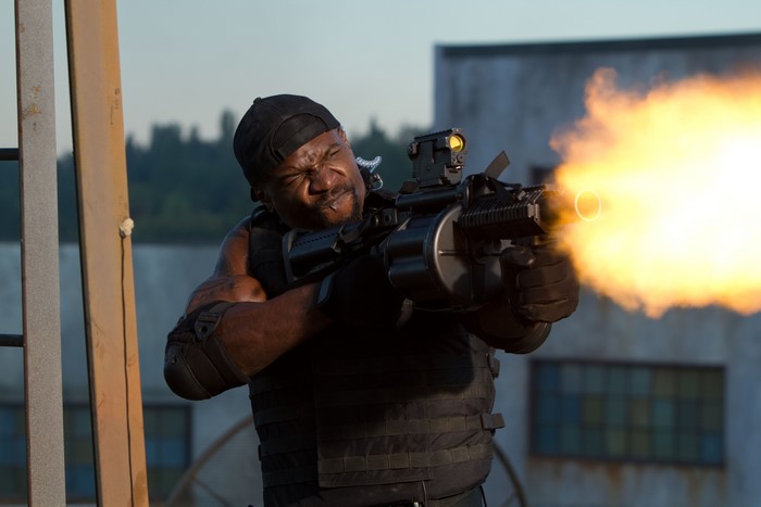 Terry Crews as Hale Caesar firing a gun