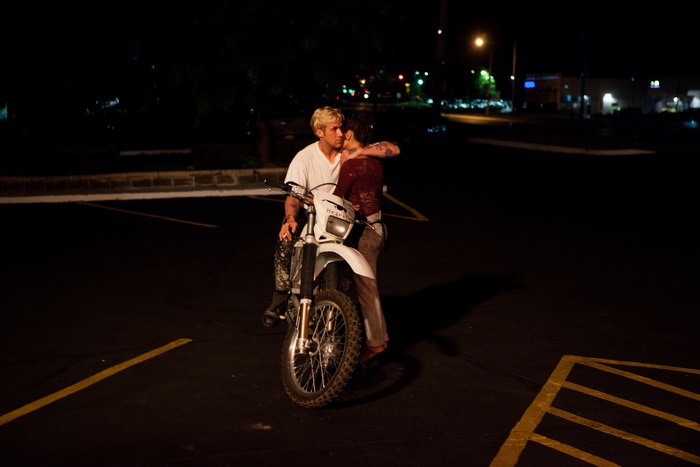 Ryan Gosling and Eva Mendes on a motorcycle