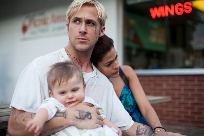Luke from The Place Beyond the Pines with baby and woman