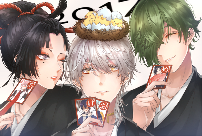 Three men with cards and chicks in a nest