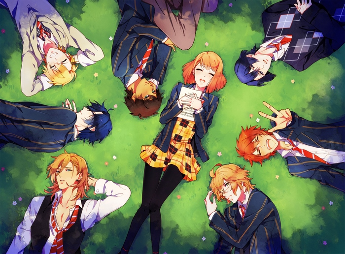 Group of students lying on grass