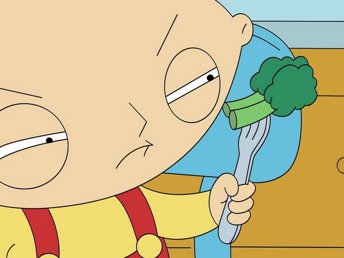 Stewie Griffin from Family Guy holding broccoli on a fork