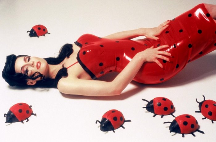 Dita Von Teese in a red polka dot latex dress