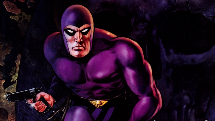 The Phantom holding a gun