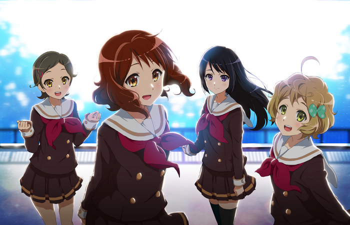 Four girls in school uniforms