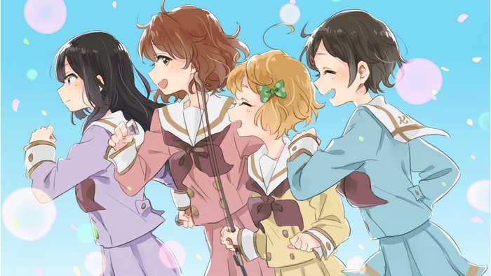 Four girls in school uniforms running