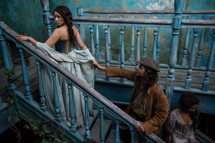 Max from Black Sails on stairs