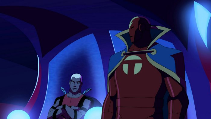 Red Tornado and another man in a blue room
