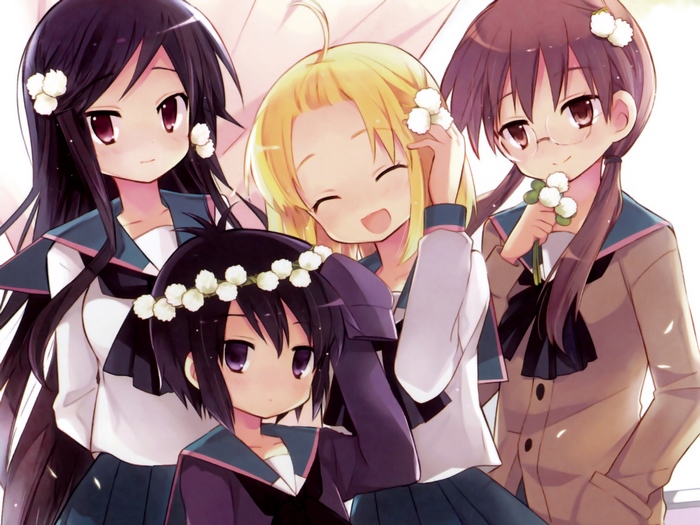 Four girls with flowers in their hair
