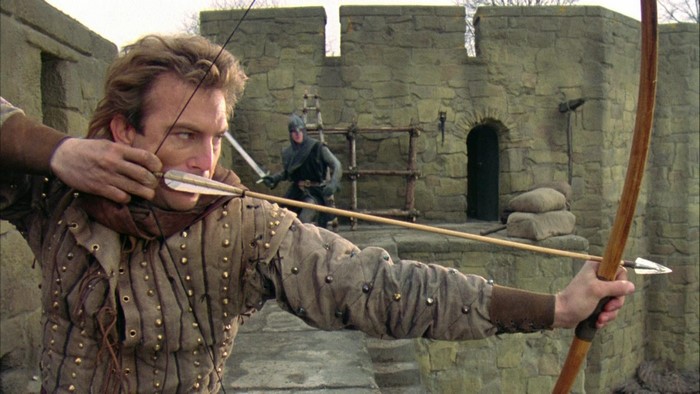 Robin Hood aiming a bow and arrow