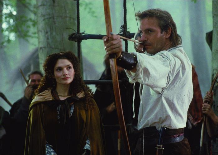 Robin Hood aiming a bow and arrow with Maid Marian