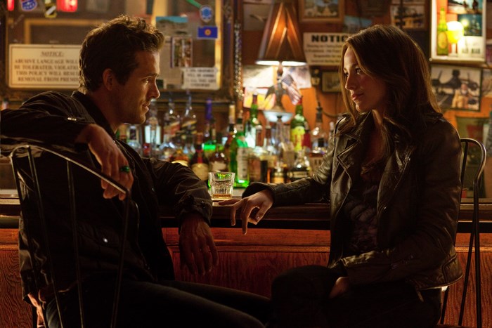 Ryan Reynolds and Rebecca Ferguson at a bar