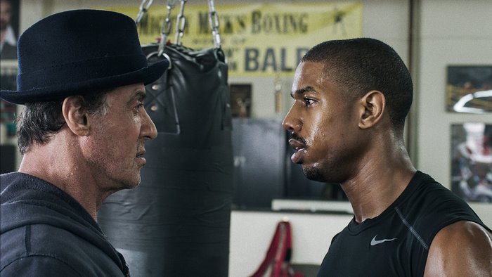 Rocky Balboa and Adonis Creed in boxing gym