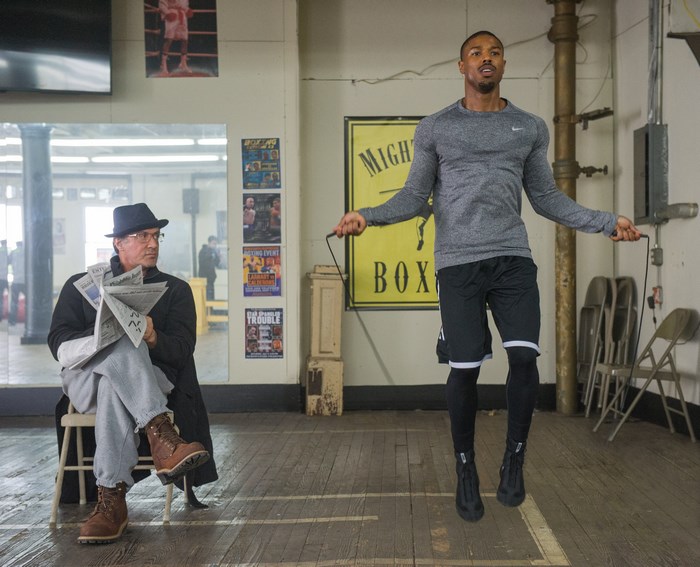 Rocky Balboa and Adonis Creed in a boxing gym