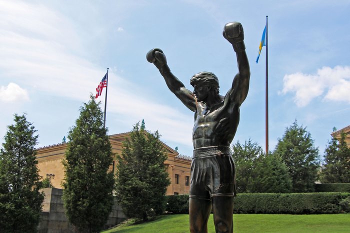 Rocky Balboa statue with American flag
