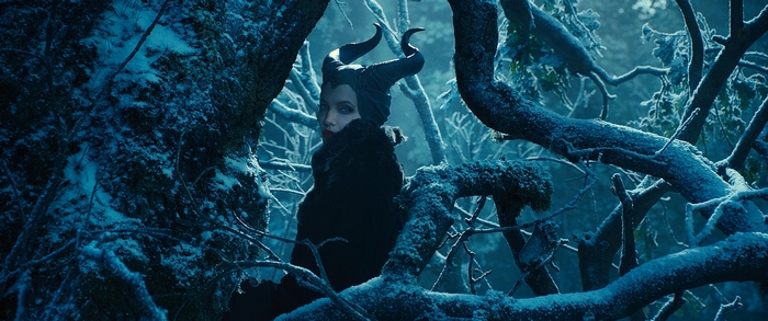 Maleficent in a snowy forest