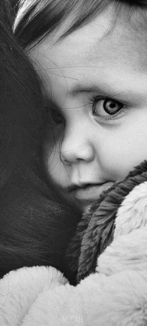 Close-up of a child's face with fur