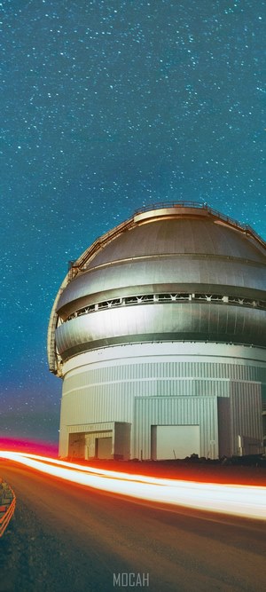 Observatory Dome Under Starry Sky with Light Trails