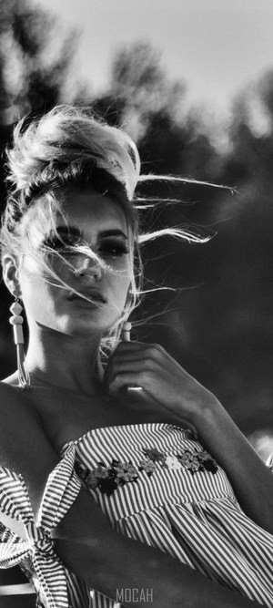 Black and white portrait of a woman outdoors