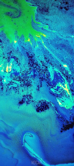 Abstract blue and green fluid art with dark speckles