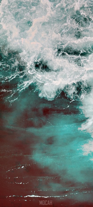 Turquoise Ocean Wave with White Foam