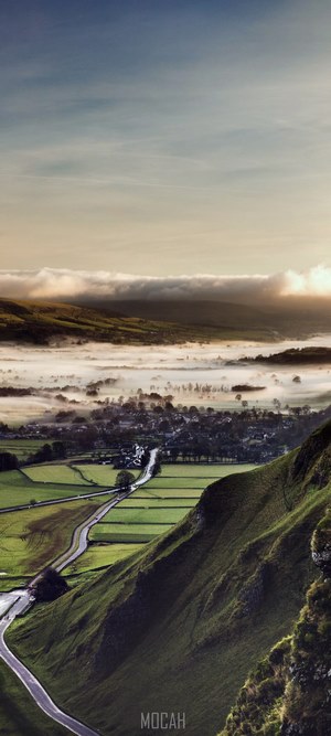 Mountain landscape with fog and road