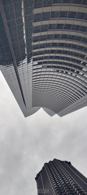 Modern skyscrapers against a cloudy sky