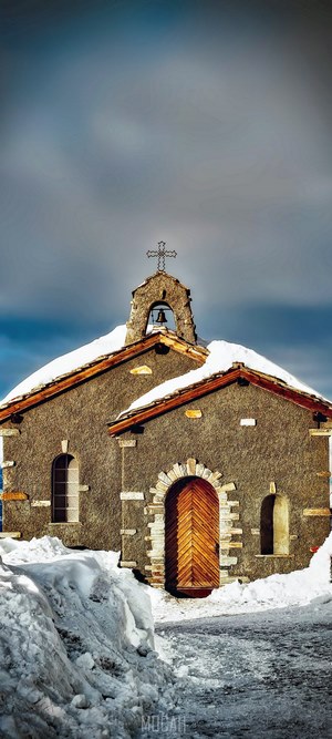 Chapel in the snow, Switzerland